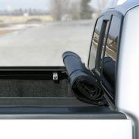 The Access Tonneau Cover stores neatly at the front of the truck bed.